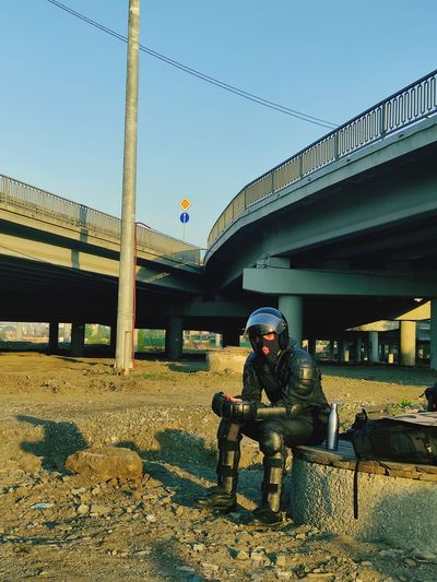 Low angle view of man standing at construction site