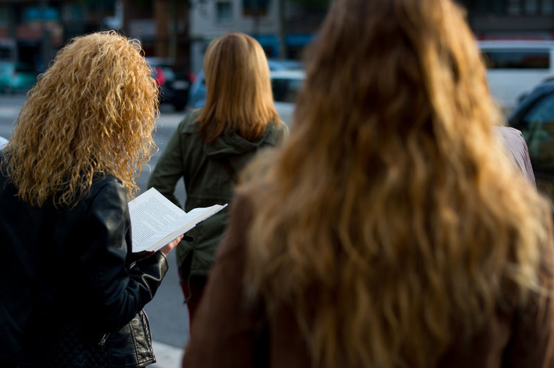 Rear view of women on street