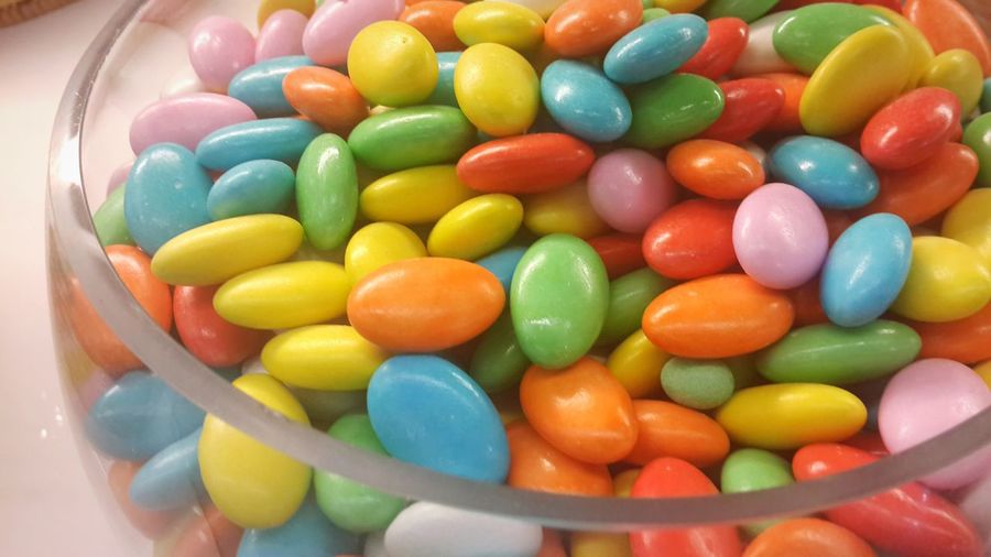 Close-up of multi colored candies in bowl