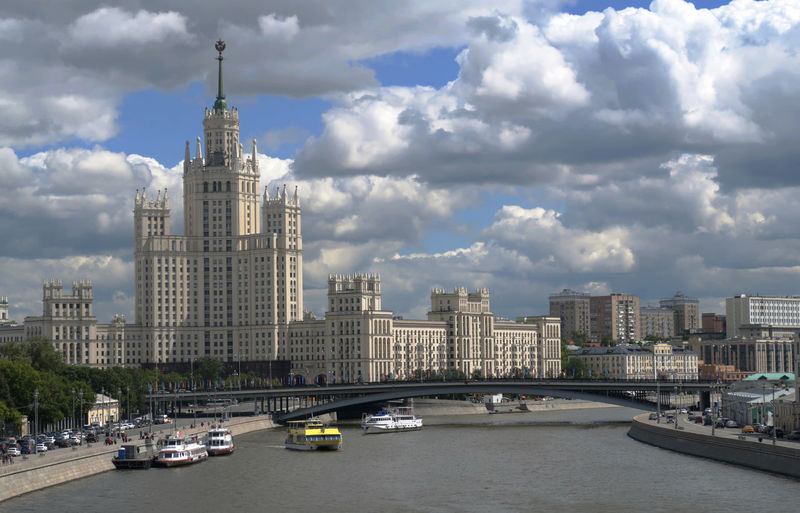 View of buildings in moscow city against cloudy sky