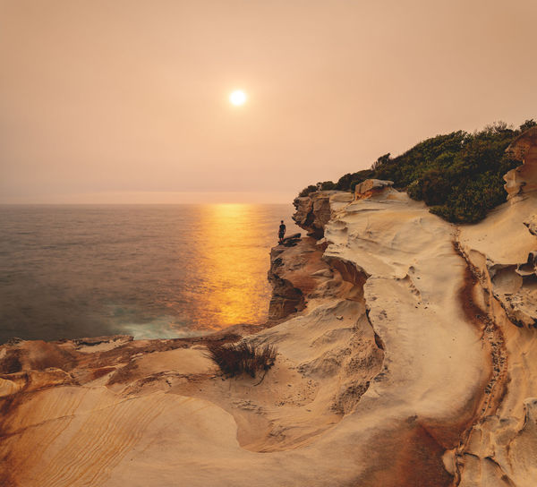 Scenic view of sea against sky during sunset