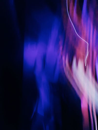 Blurred motion of illuminated light painting at night