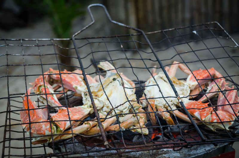 Close-up of crab meat on barbecue grill