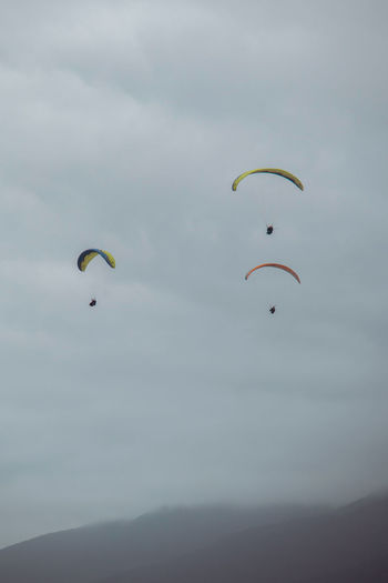 Low angle view of kite flying in sky