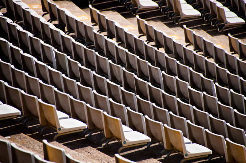 High angle view of empty chairs in stadium 