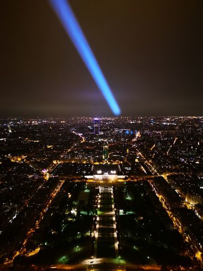 Aerial view of illuminated buildings in city at night - paris 