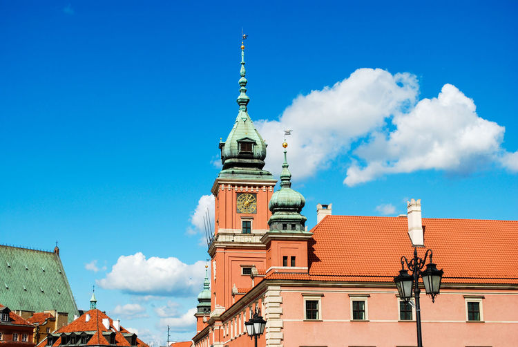 Low angle view of building against blue sky
