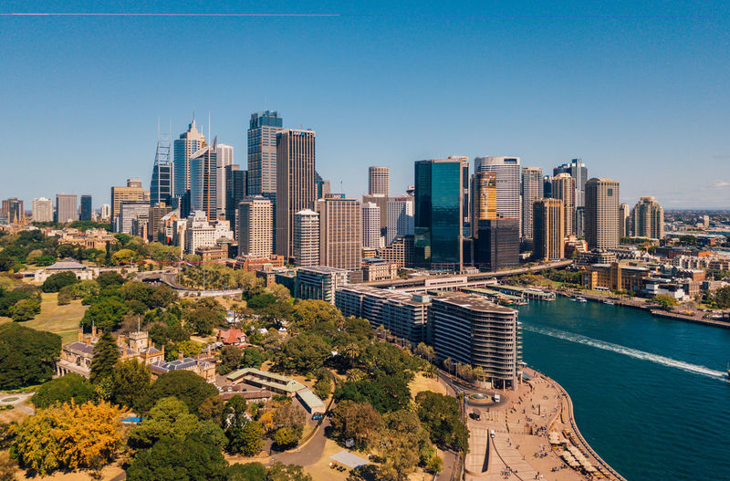 Beautiful panorama of the sydney harbour district with harbour bridge, botanical garden.