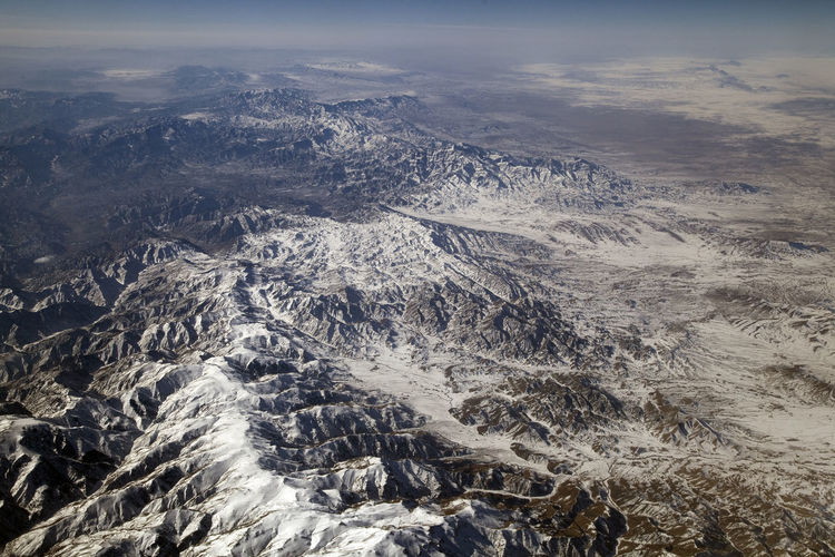Rugged landscape of hindukush in winter season photographed from airplane