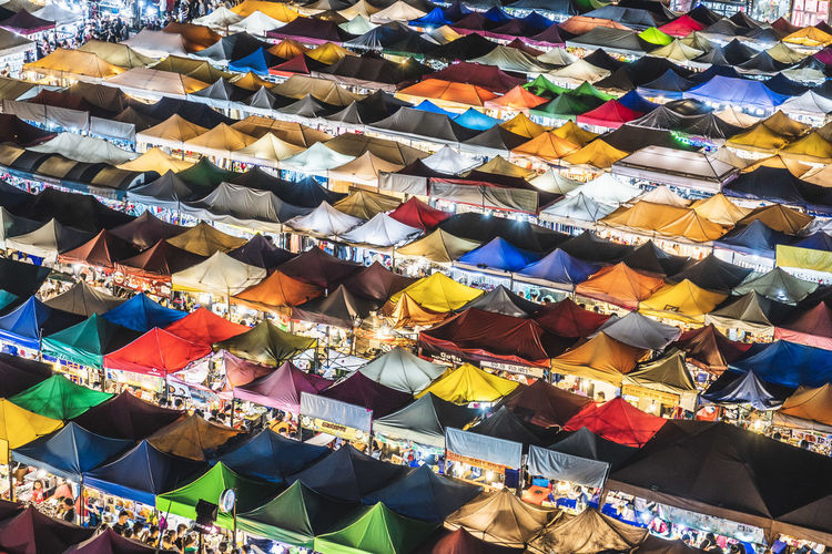 High angle view of multi colored umbrellas for sale in market