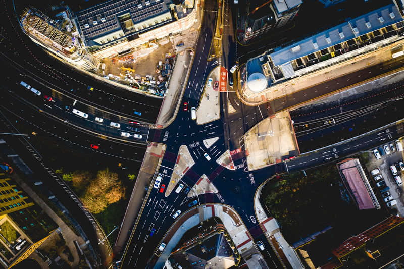 High angle view of buildings and complex road intersection in city