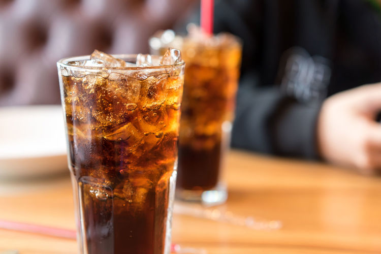 Close-up of beer glass on table