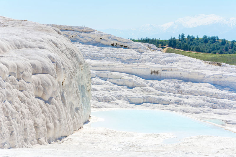 Natural travertine pools and terraces in pamukkale at turkey. 