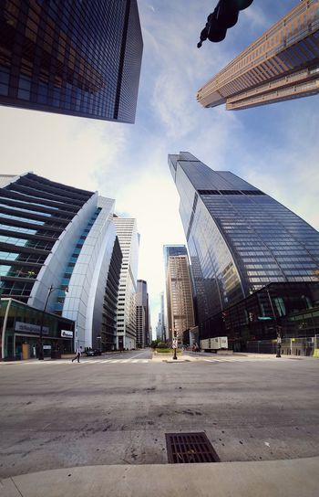 Modern buildings in city against sky