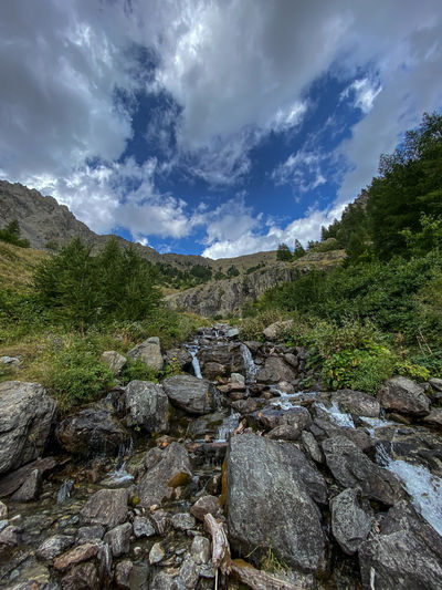 Scenic view of stream against sky