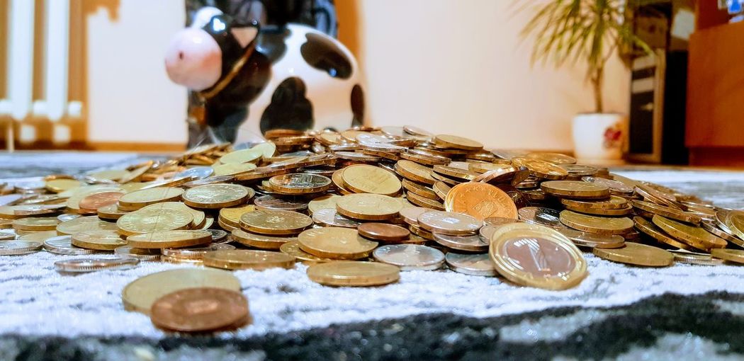 Close-up of coins on table