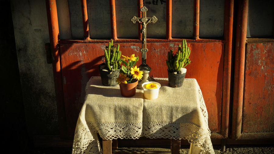 Close-up of vase on table at home