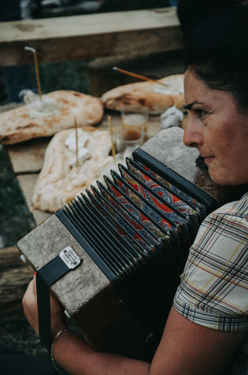 Midsection of man preparing food