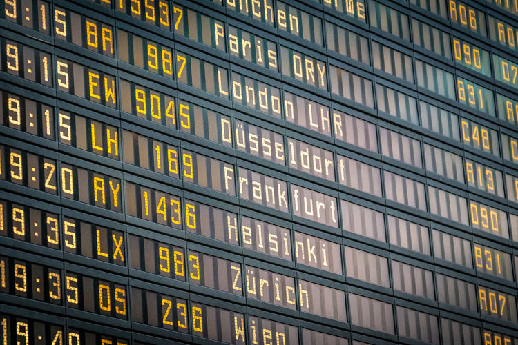 Full frame shot of illuminated arrival departure board