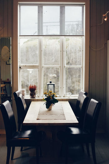 Empty chairs and table at home
