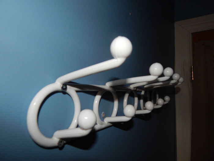Close-up of hooks mounted on wall