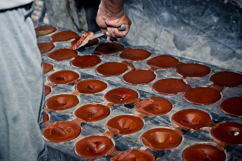 High angle view of man preparing food