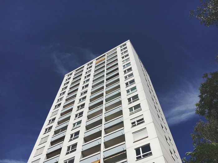 Low angle view of white building against sky