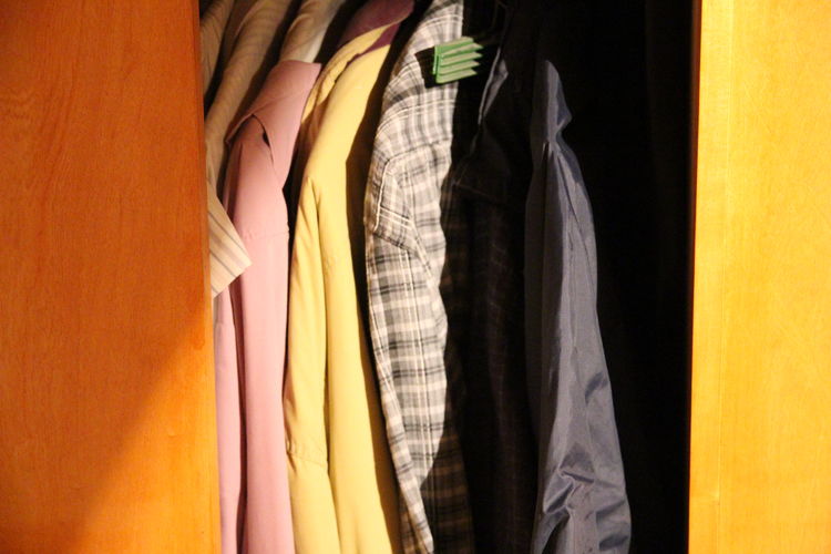 Close-up of shirts in closet