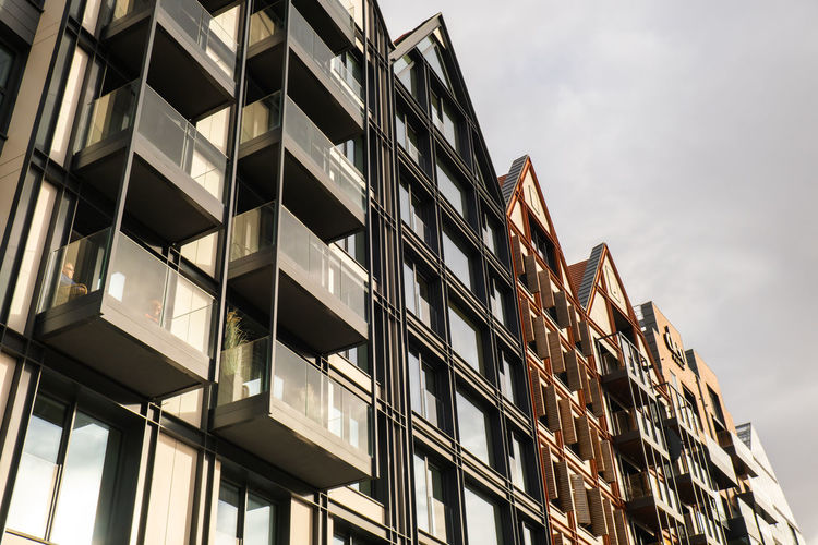 Modern buildings on granary island over the motlawa river in old town. abstract structure. creative
