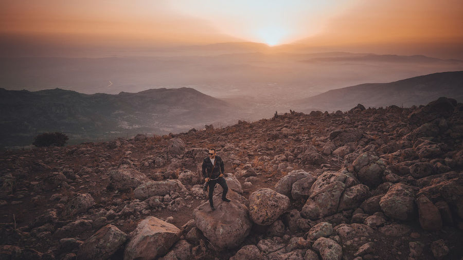 Scenic view of landscape against sky during sunset