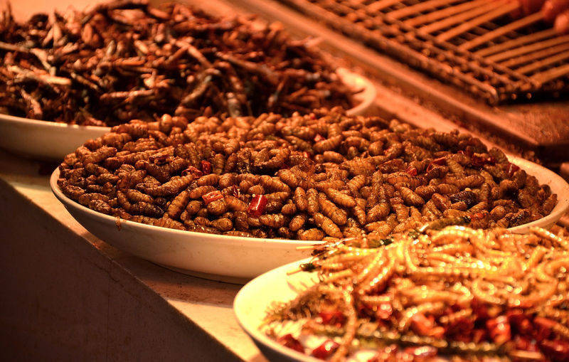Close-up of fried food in plates on table