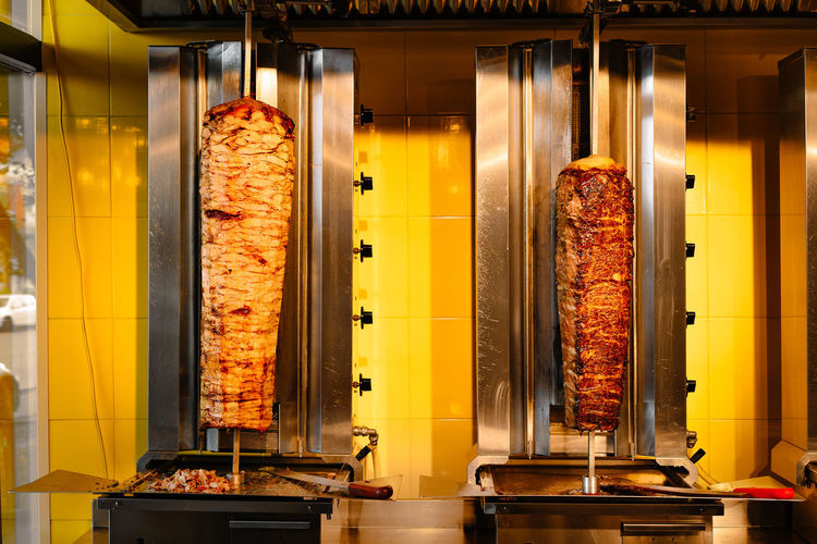 View of kebab meat in illuminated restaurant