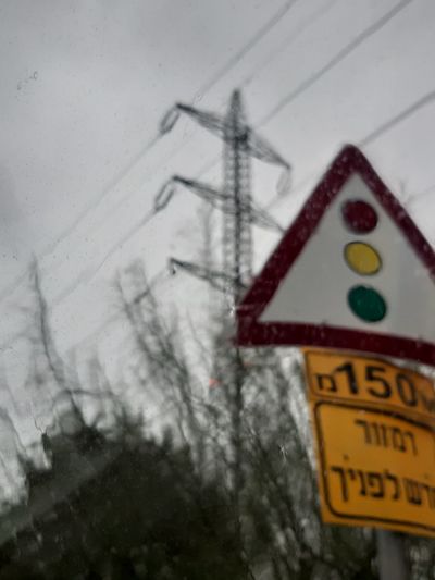 Close-up of sign on snow