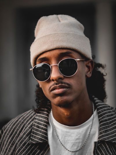 Portrait of young man wearing sunglasses