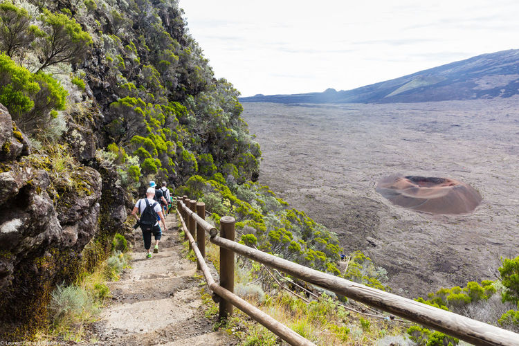 High angle view of people hiking by piton de la fournaise at reunion island