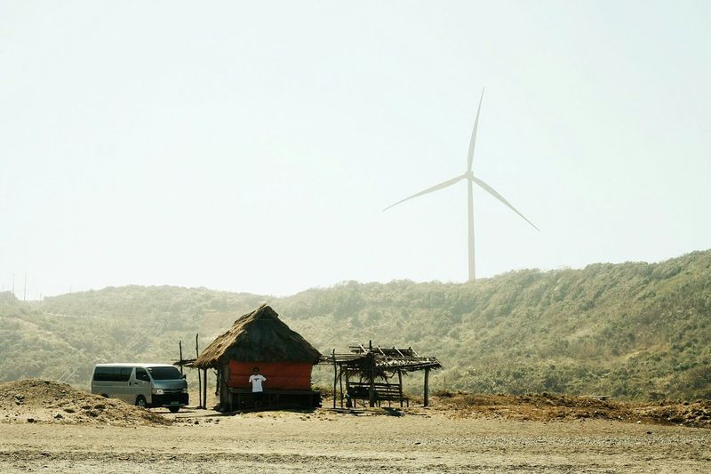 Traditional windmill on field