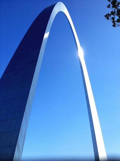 Low angle view of gateway arch against clear blue sky