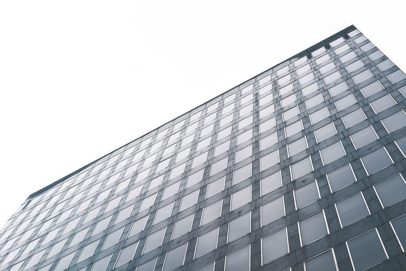 Low angle view of skyscraper against clear sky