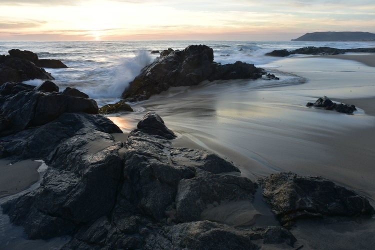 Scenic view of sea against sky during sunset