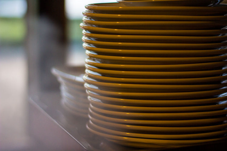 Stack of plates on table