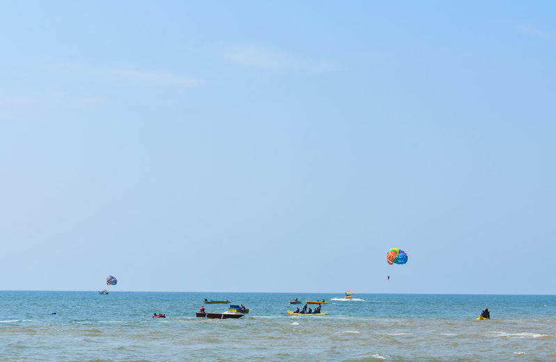 View of boats in sea against sky