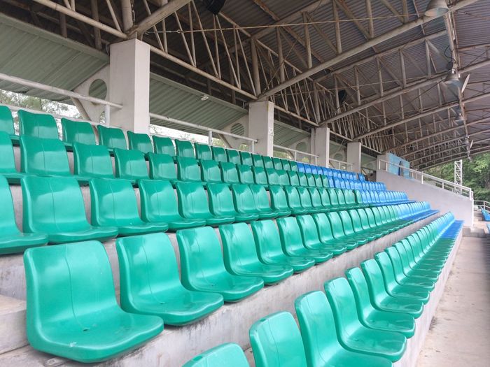 Empty seats in row at stadium