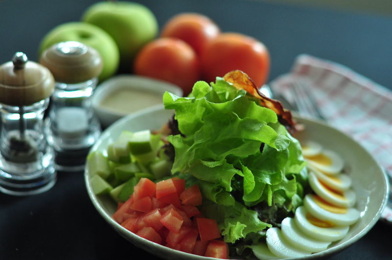 Close-up of salad served on table