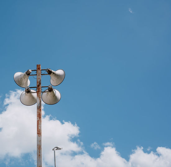 Low angle view of street light against sky