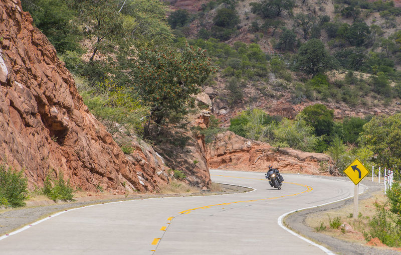 Man driving on touring motorbike, potosi, bolivia