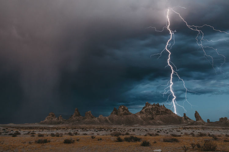 Lightning strikes the tufa formations at trona pinnacles, california