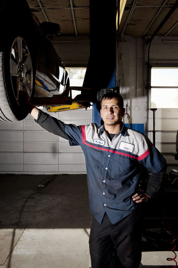 Full length of man standing in factory