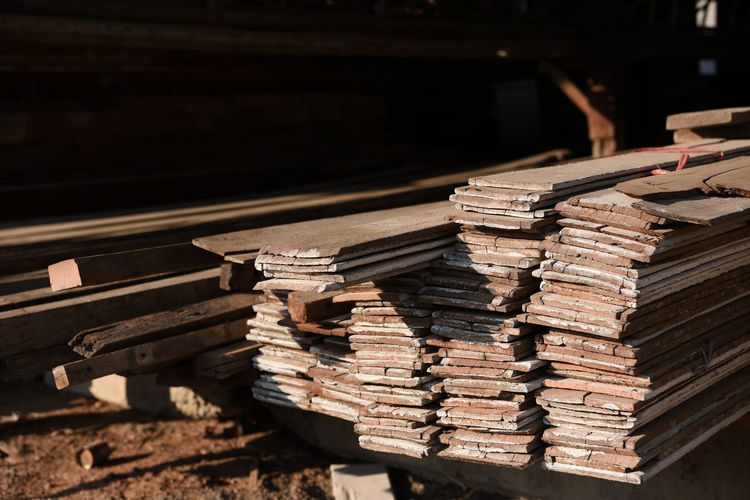 Stack of old books on railroad track