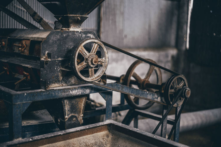Close-up of old machinery in factory