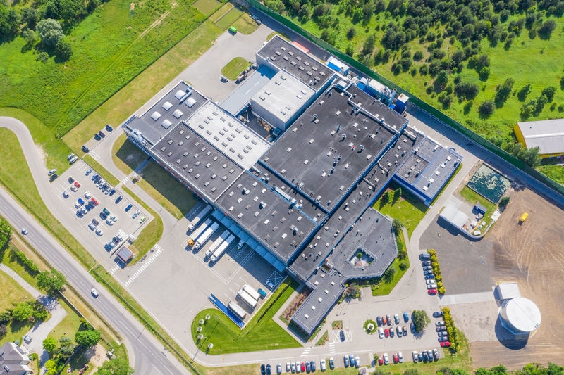 Aerial drone view on warehouse and logistic center. logistic and transport concept